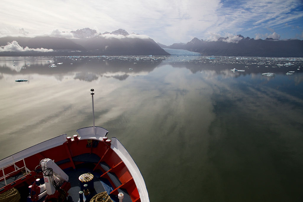 Fishermen approach glacier