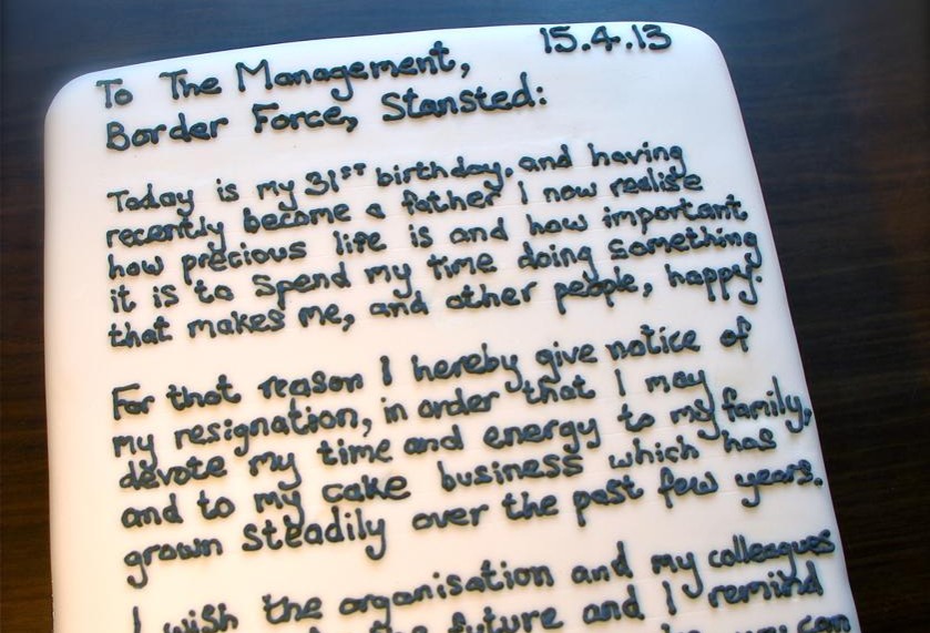 a resignation letter written on a cake
