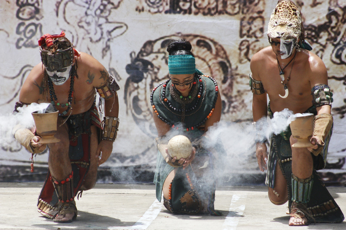 Members of the Maya people of Guatemala perform a ceremonial ritual in honor of the sun