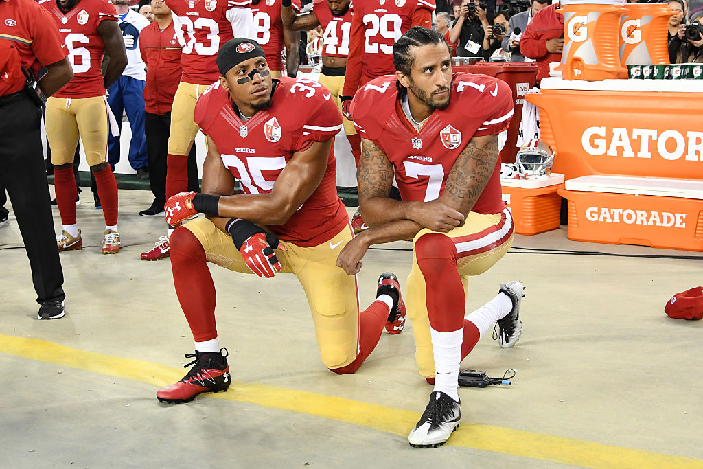 San Francisco 49ers kneel in protest during the national anthem prior to playing the Los Angeles Rams in their NFL game-603553668