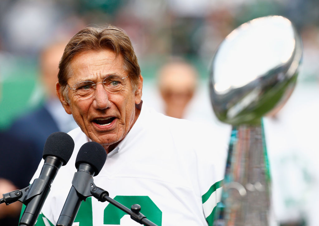 Joe Namath-1052138074 EAST RUTHERFORD, NJ - OCTOBER 14: Joe Namath speaks during a Super Bowl III 50th Anniversary celebration during halftime of the game between the New York Jets and the Indianapolis Colts at MetLife Stadium on October 14, 2018 in East Rutherford, New Jersey.