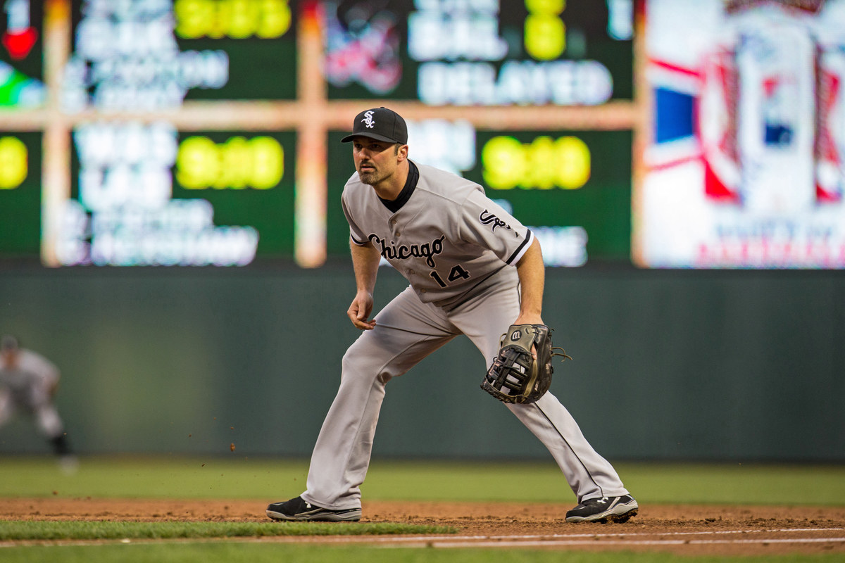 Paul Konerko #14 of the Chicago White Sox fields in 2014