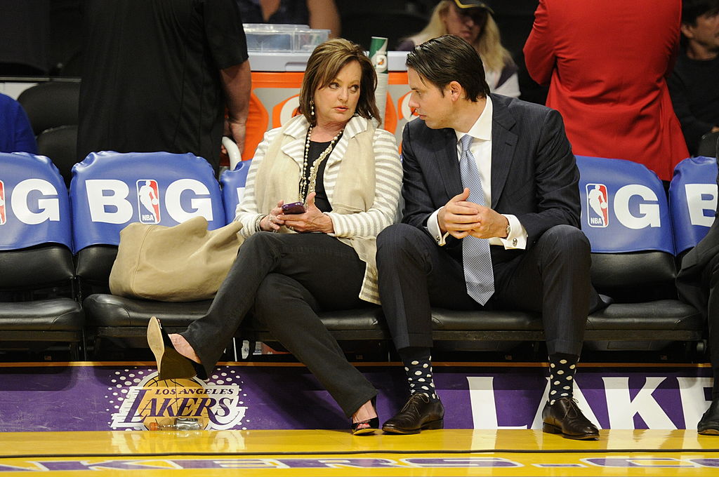 Ann and Josh Kroenke chat before game 7 of the first round of the NBA playoffs
