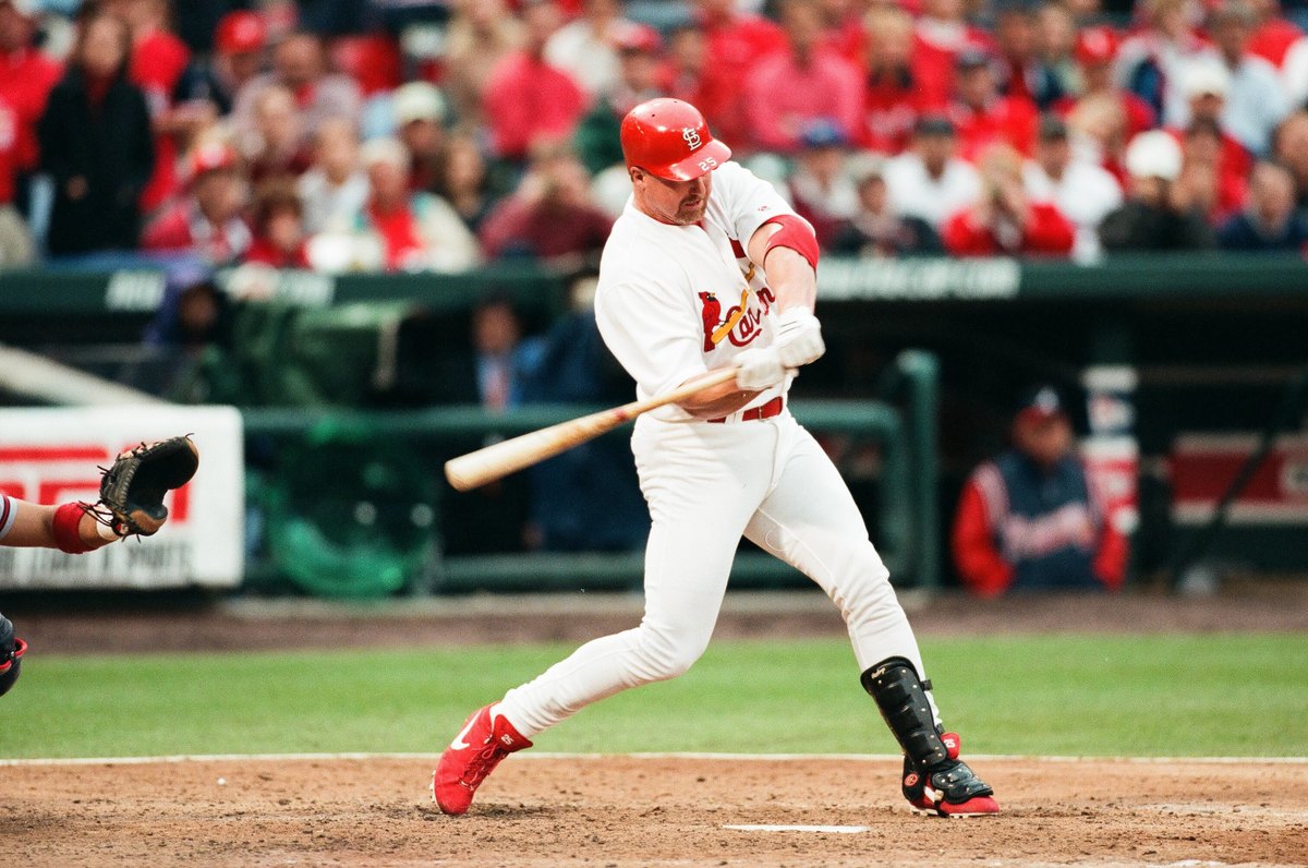 Mark McGwire of the St. Louis Cardinals bats against the Atlanta Braves in 2000