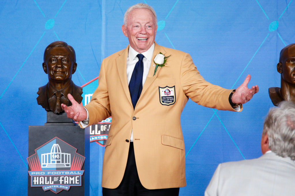jerry jones-826807428 CANTON, OH - AUGUST 05: Dallas Cowboys owner Jerry Jones reacts following the Pro Football Hall of Fame Enshrinement Ceremony at Tom Benson Hall of Fame Stadium on August 5, 2017 in Canton, Ohio.