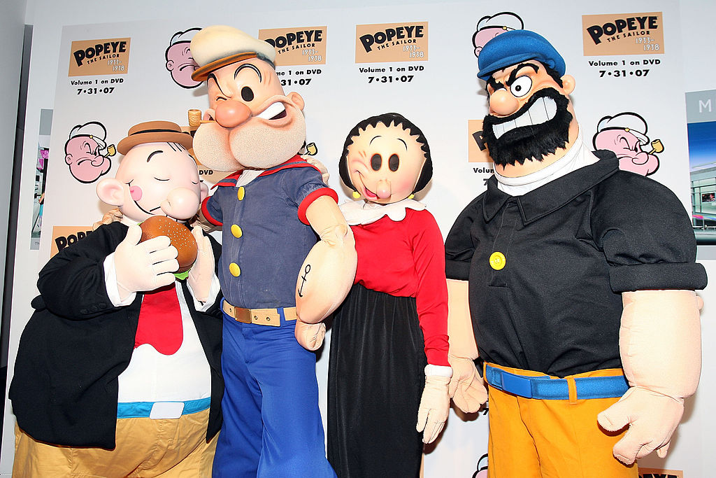 Four individuals dressed as 'Popeye' characters