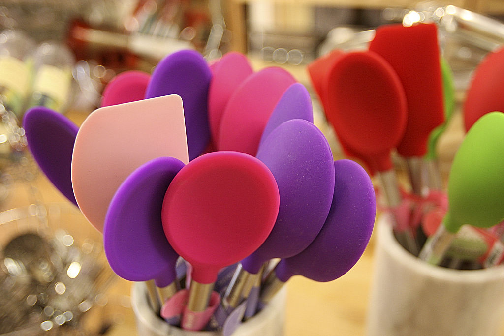 colorful spatulas on display at a store