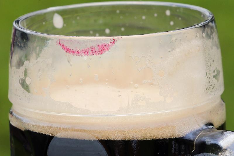Lipstick smears can be seen on a glass of freshly tapped beer at a press conference regarding the 21st International Berlin Beer Festival