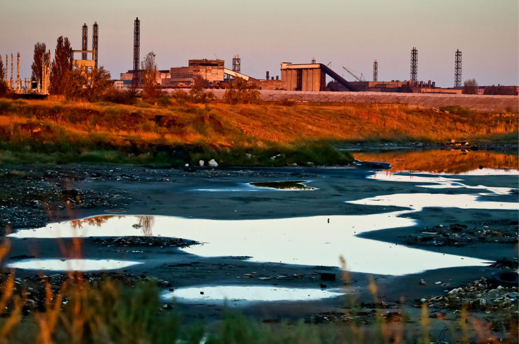 Polluted water seeping into the ground 