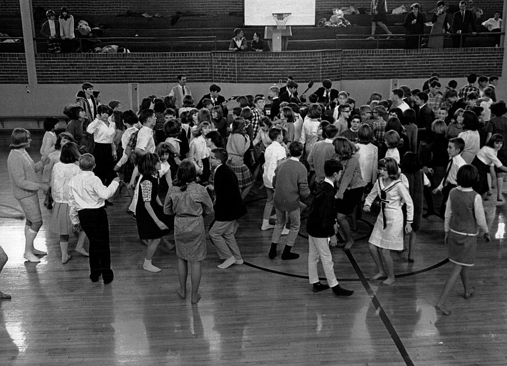 Teens dancing in their socks 