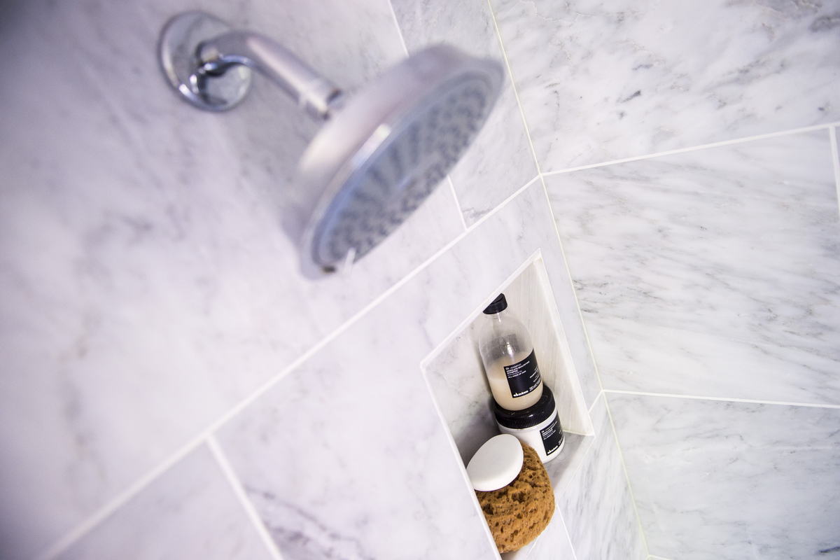 A shower is seen as Sara Goo shows off her recently renovated bathroom in her home