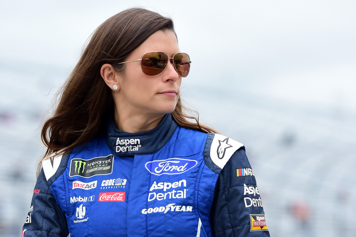 Danica Patrick wearing sunglasses on the track