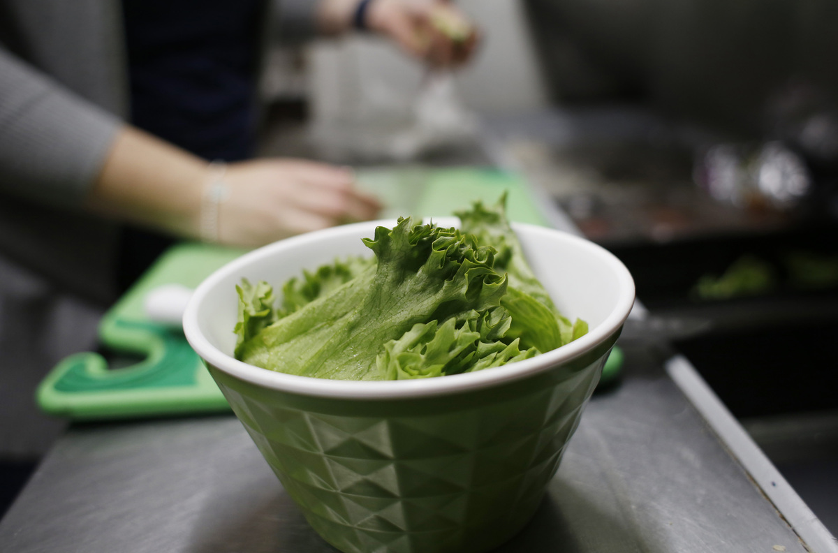 Romaine lettuce in a bowl at a coffee shop
