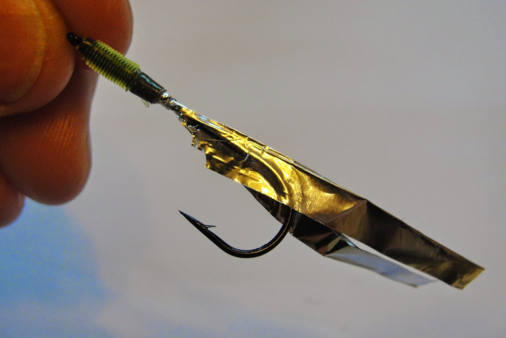 Foil attached to fishing hook 
