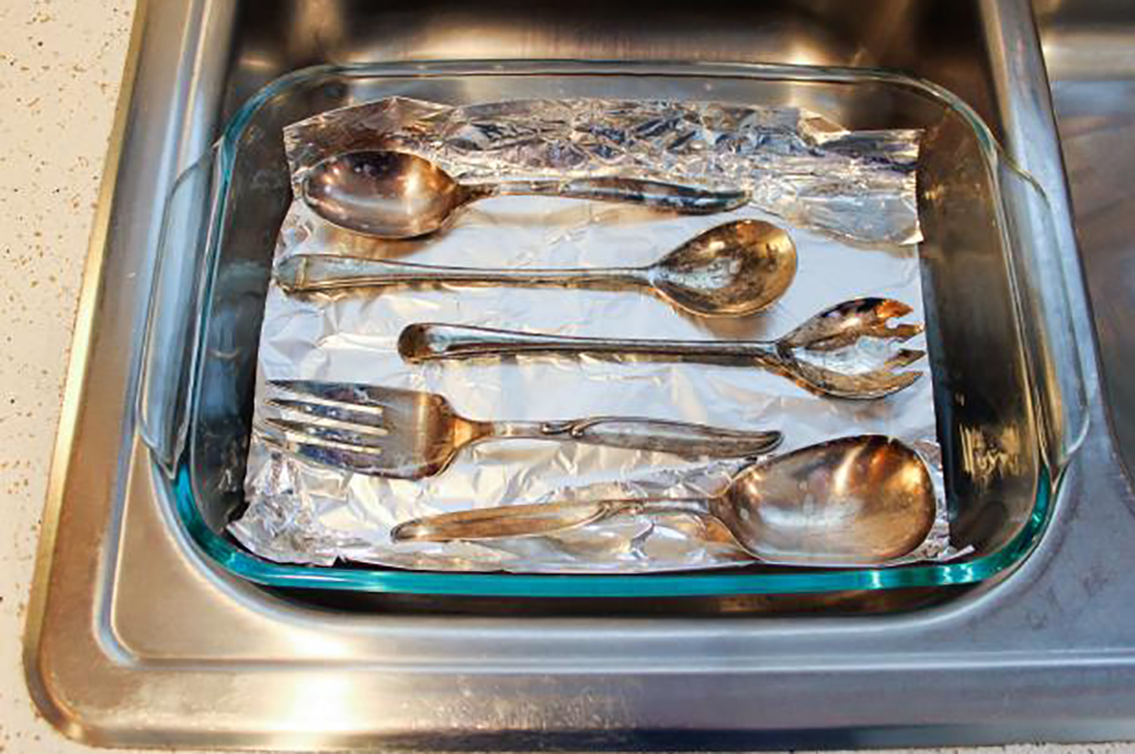 Silverware in dish with foil 