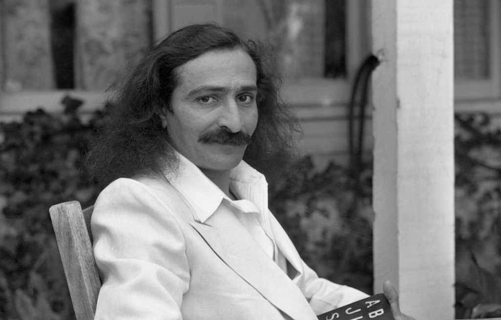 Meher Baba with an alphabet board after seven years of silence 