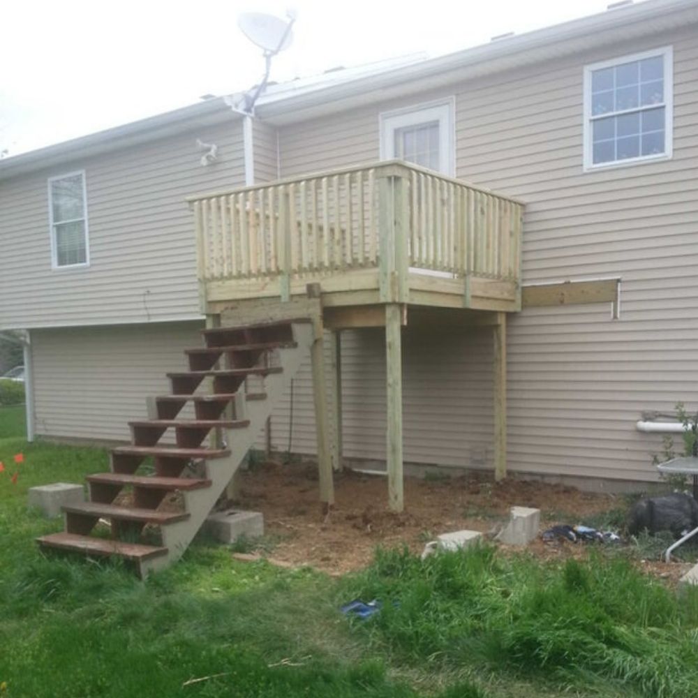 crooked porch and stairs to nowhere