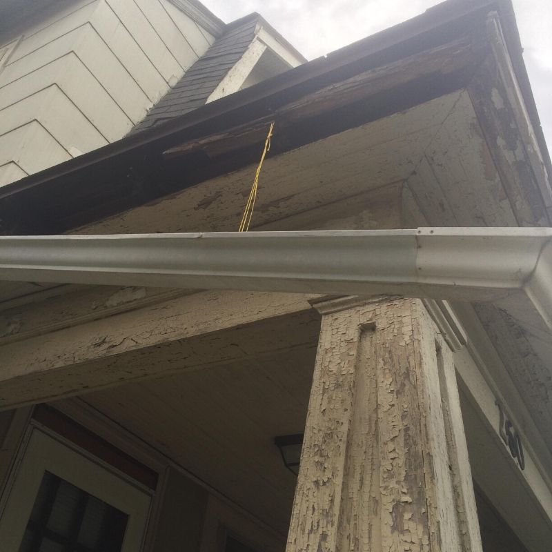 hanging gutter with a piece of string