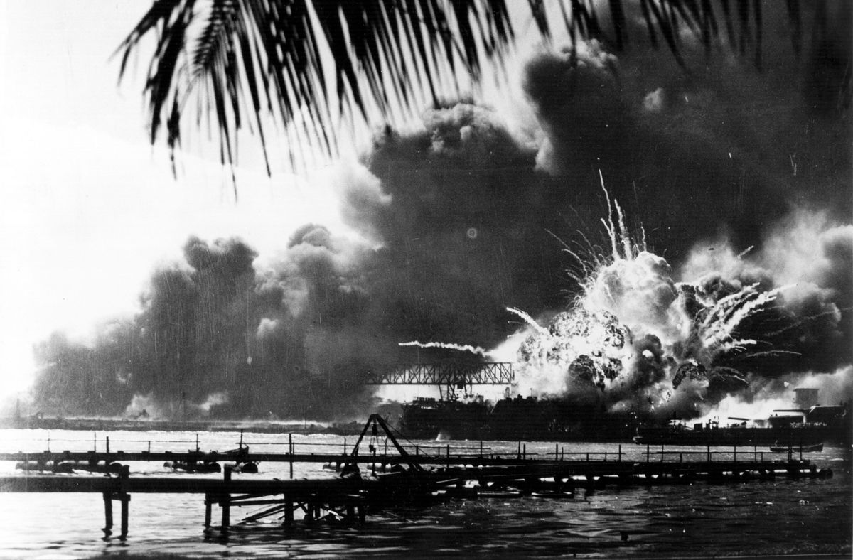 The American destroyer USS Shaw explodes during the Japanese attack on Pearl Harbour.