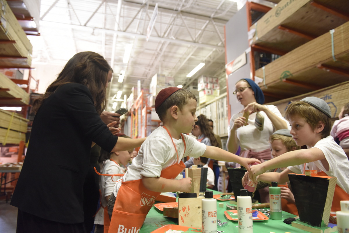 Kids participate in a crafting class at Home Depot.