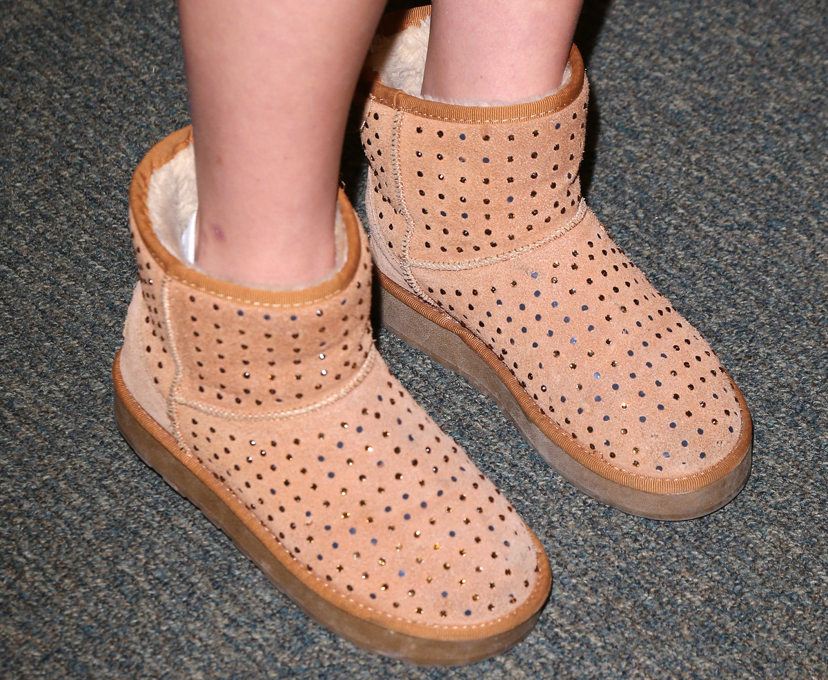 Ali Simpson wears uggs with jewels on them.