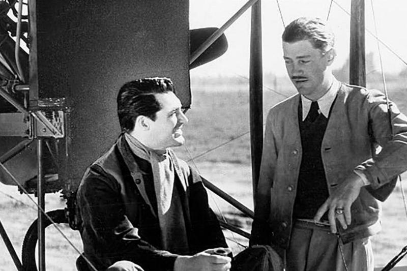 Howard Hughes and Grant on a plane 