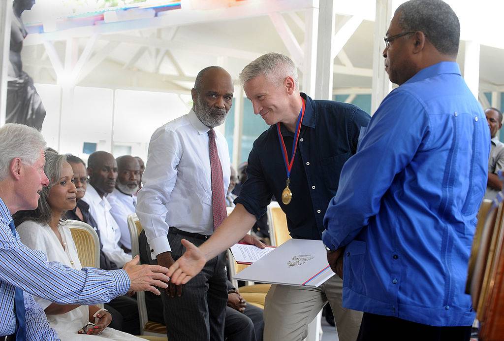 cooper wearing a medal