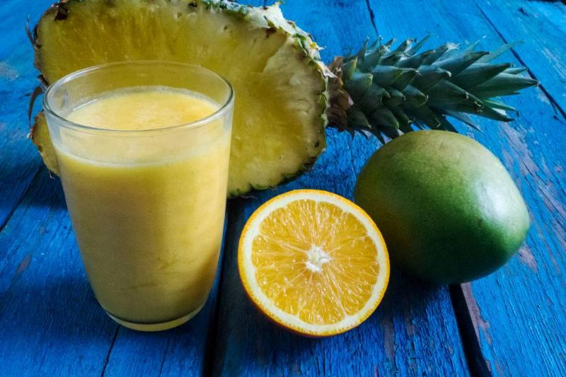 pinepple lemon and mango beside smoothie