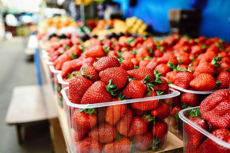 Strawberries are sold at the Roofed Market