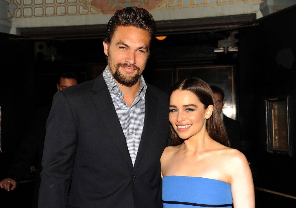 Actors Jason Momoa (L) and Emilia Clarke