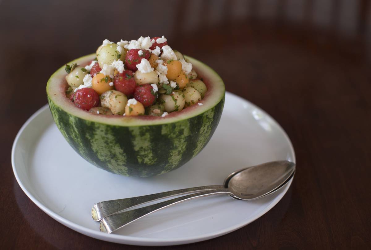 A melon-chili salad is topped with feta cheese.
