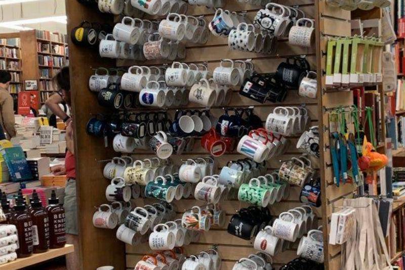 mugs hanging on wall that look like matrix glitch