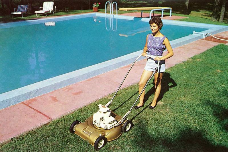 Woman Mowing Lawn Poolside