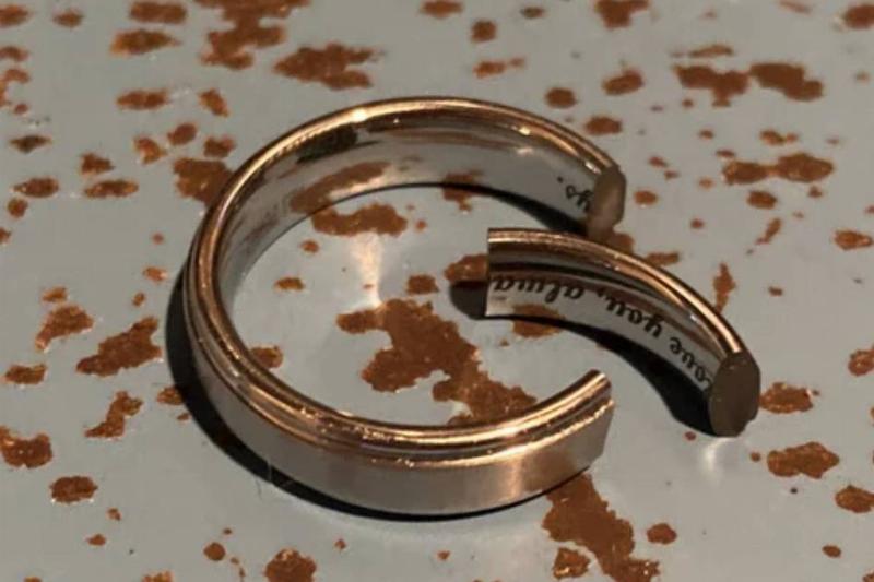 wedding band is broken with segment entirely detached