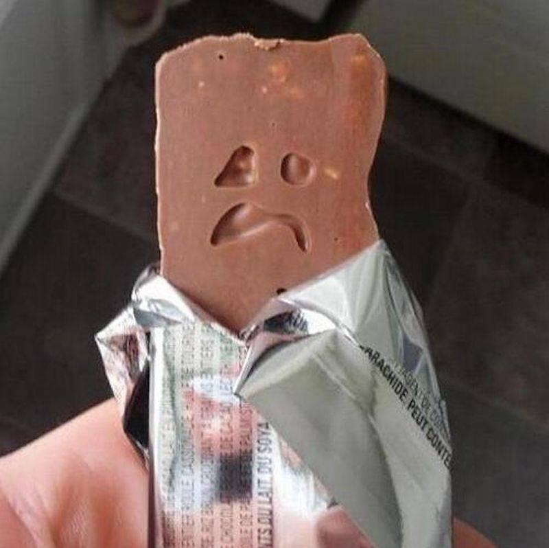 sad face on chocolate bar