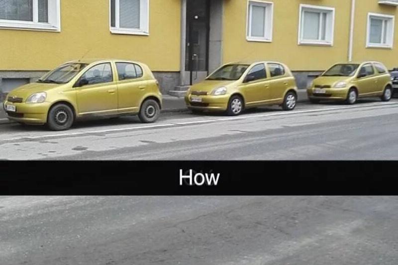 mustard cars in front of mustard buildings