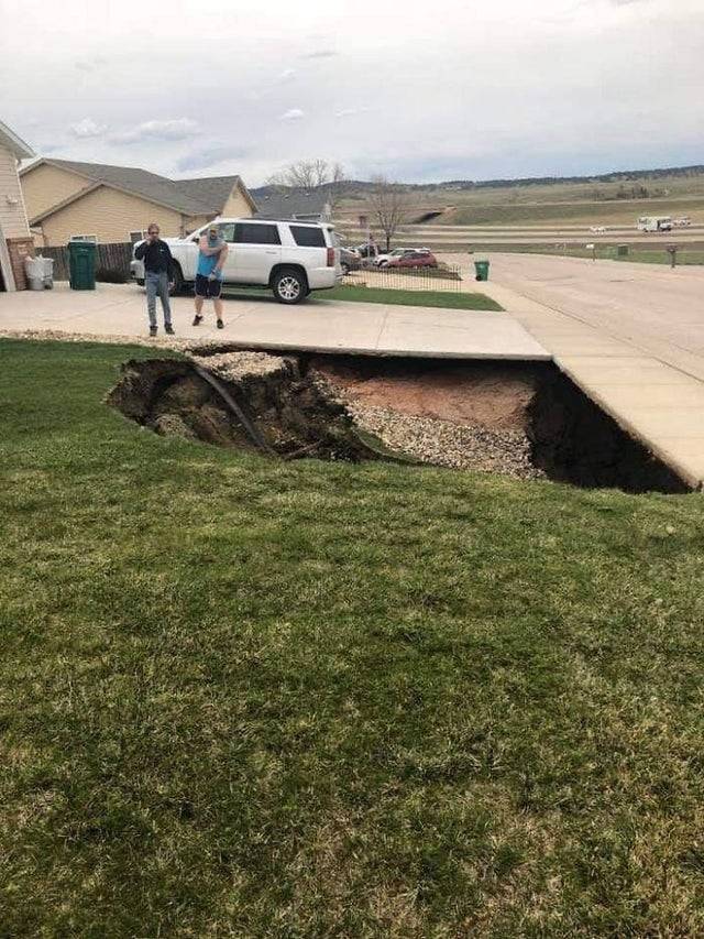 sink hole in south dakota neighborhood
