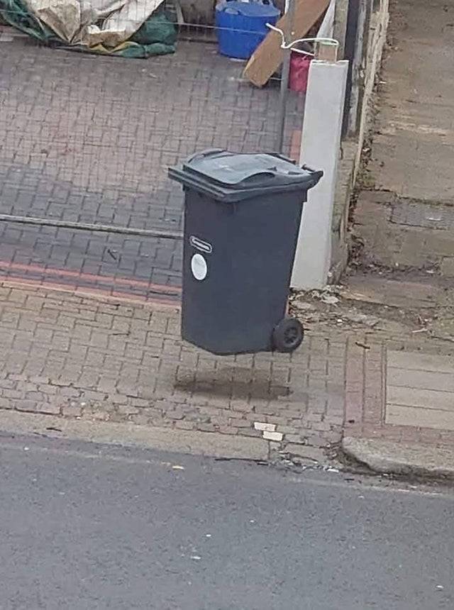 trash can looks like its floating