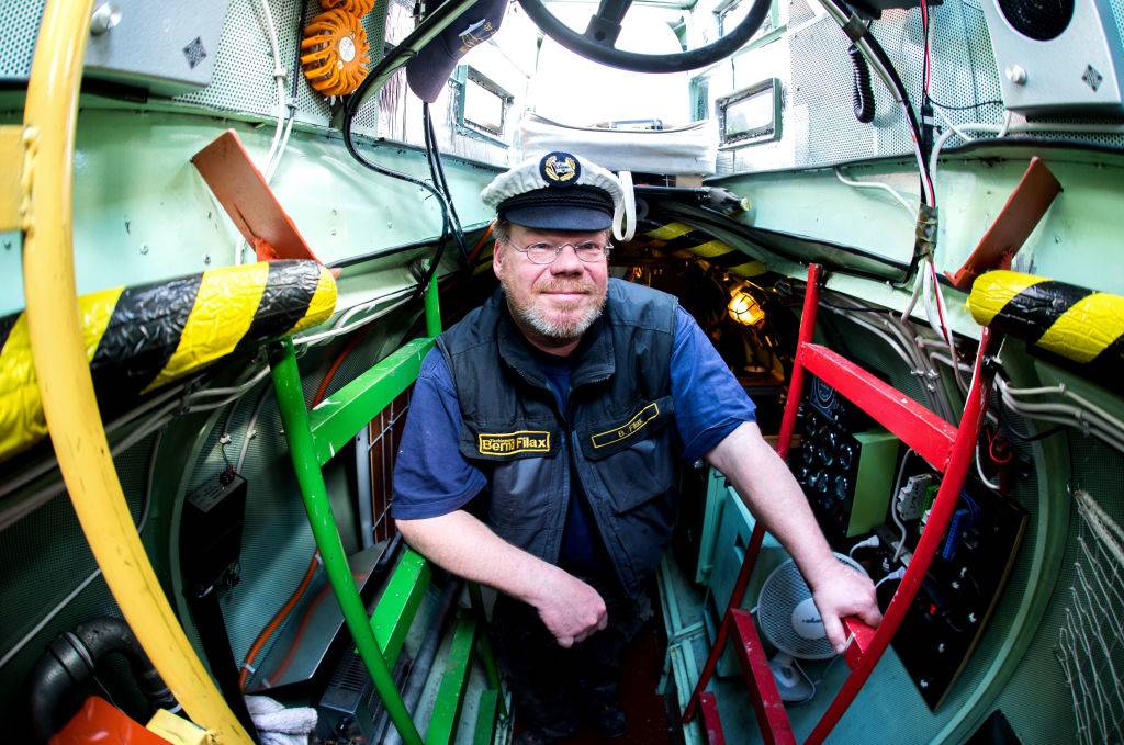 a man aboard a submarine