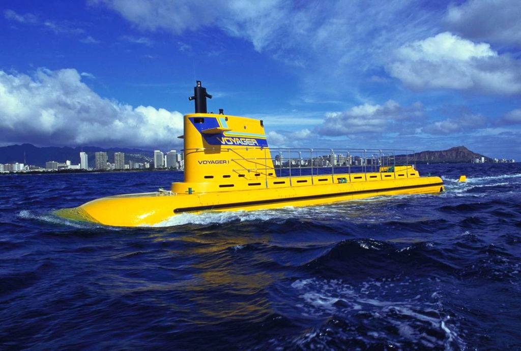 a yellow submarine above the water