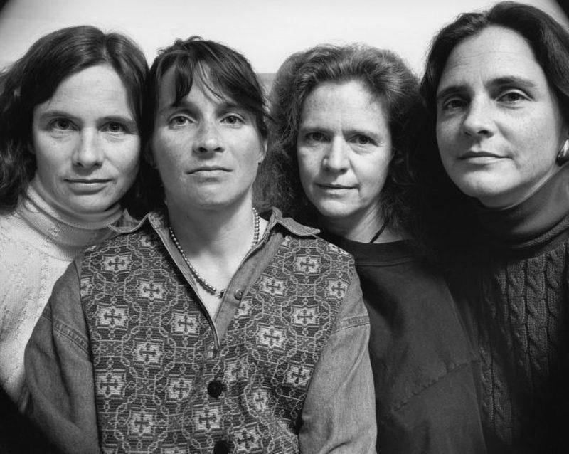 four sisters in sweaters