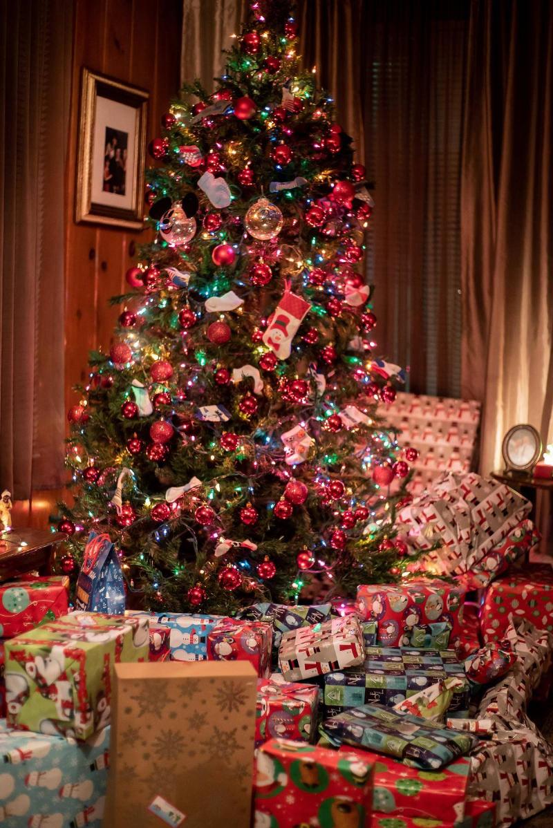 Christmas tree with presents under it. 