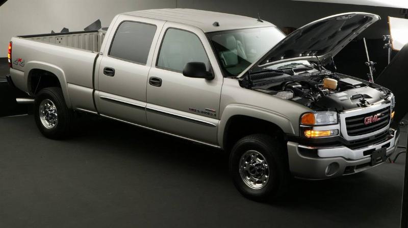 GMC's 4x4 diesel pickup truck with raised hood.