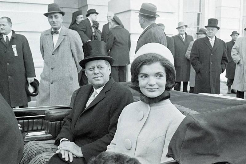 jackie and john f. kennedy in a carriage in 1961
