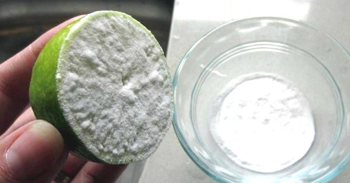a lime that's covered in baking soda with a bowl
