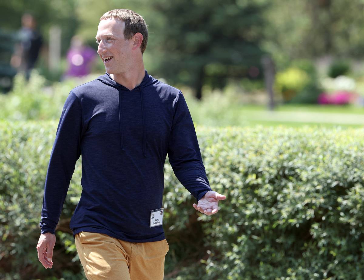 CEO of Facebook Mark Zuckerberg walks to lunch following a session at the Allen & Company Sun Valley Conference