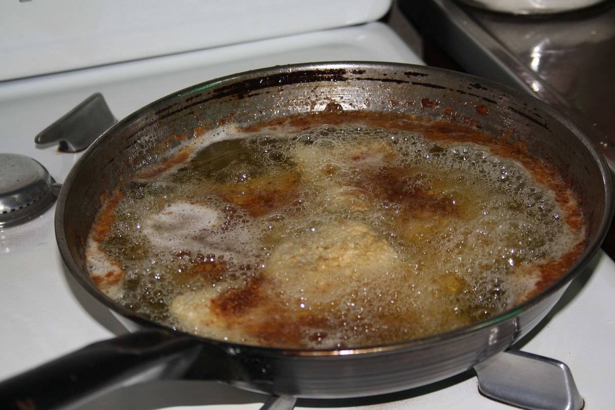 Español: Milanesa en sarten