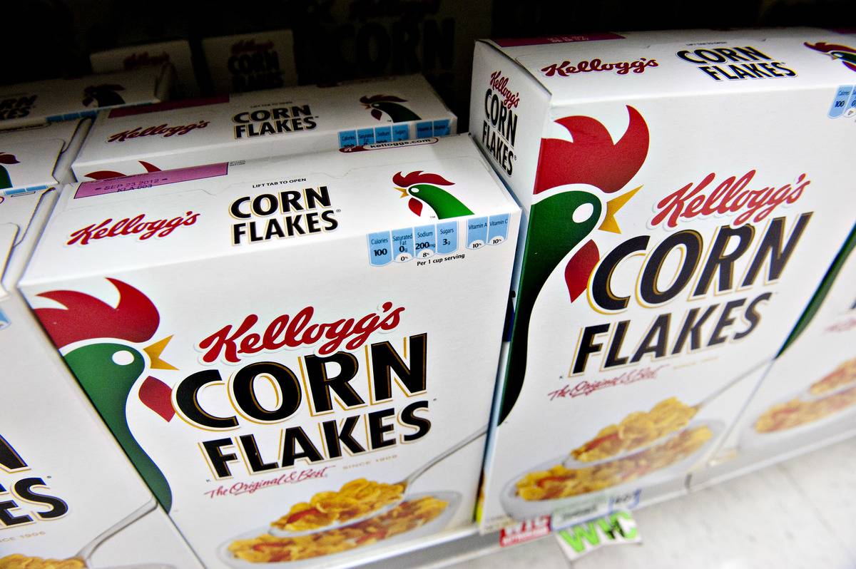 Kellogg Co. Corn Flakes brand breakfast cereal sits on display in a supermarket in Princeton, Illinois, U.S., on Friday, Jan. 27, 2012