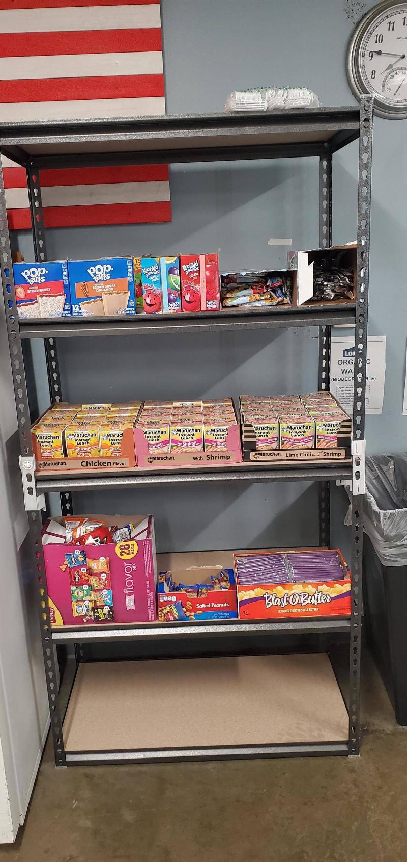 Noodles and snacks on shelf at Lowe's