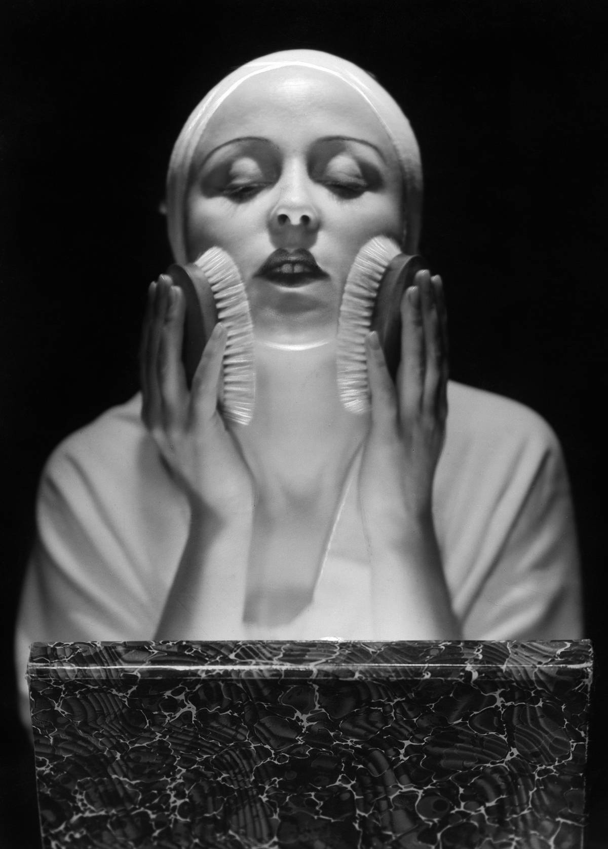 Facial massage with brushes. Published in 